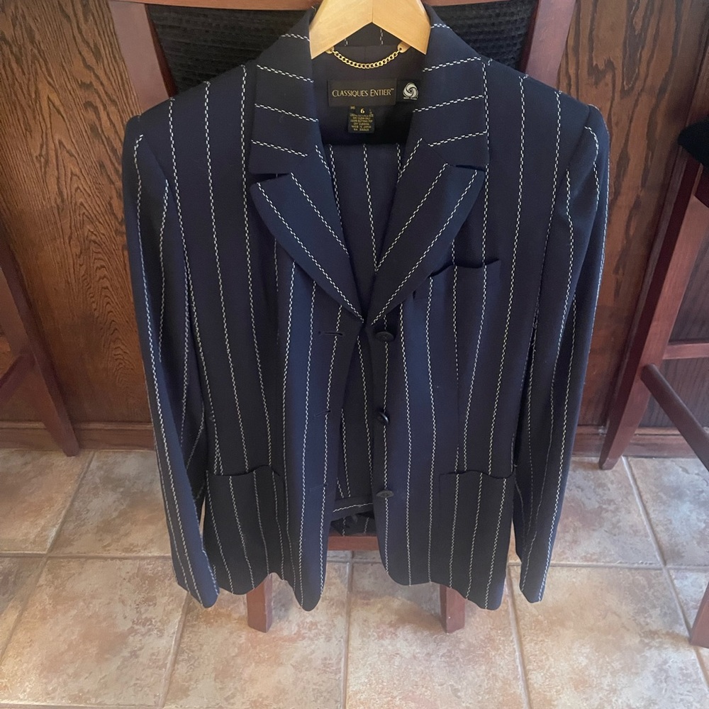 A navy women striped suit in great condition!